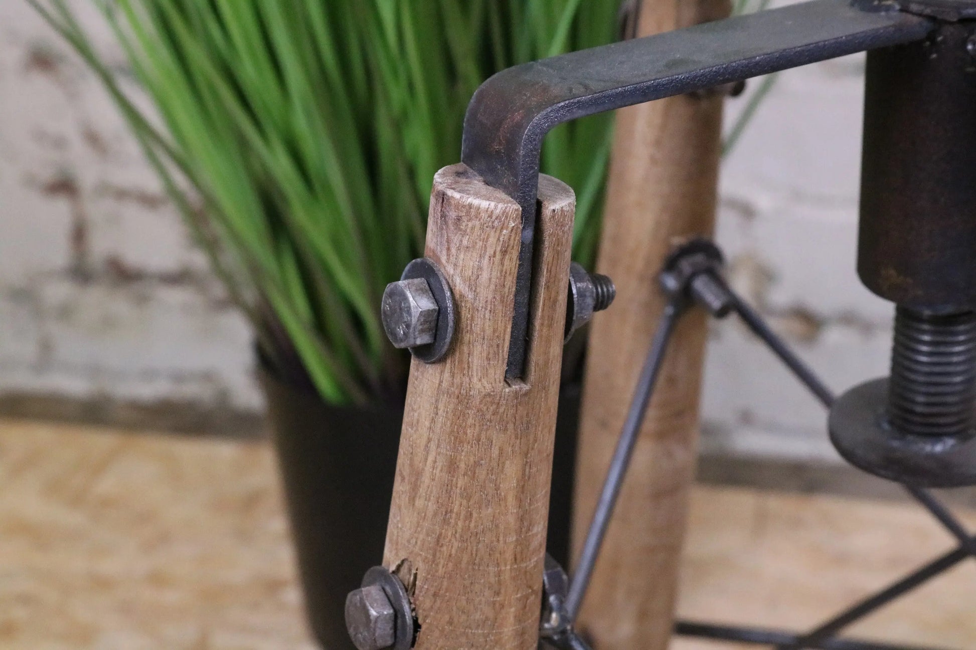 Chayana Adjustable Industrial Stool - Closeup of Metal Bracket Detail