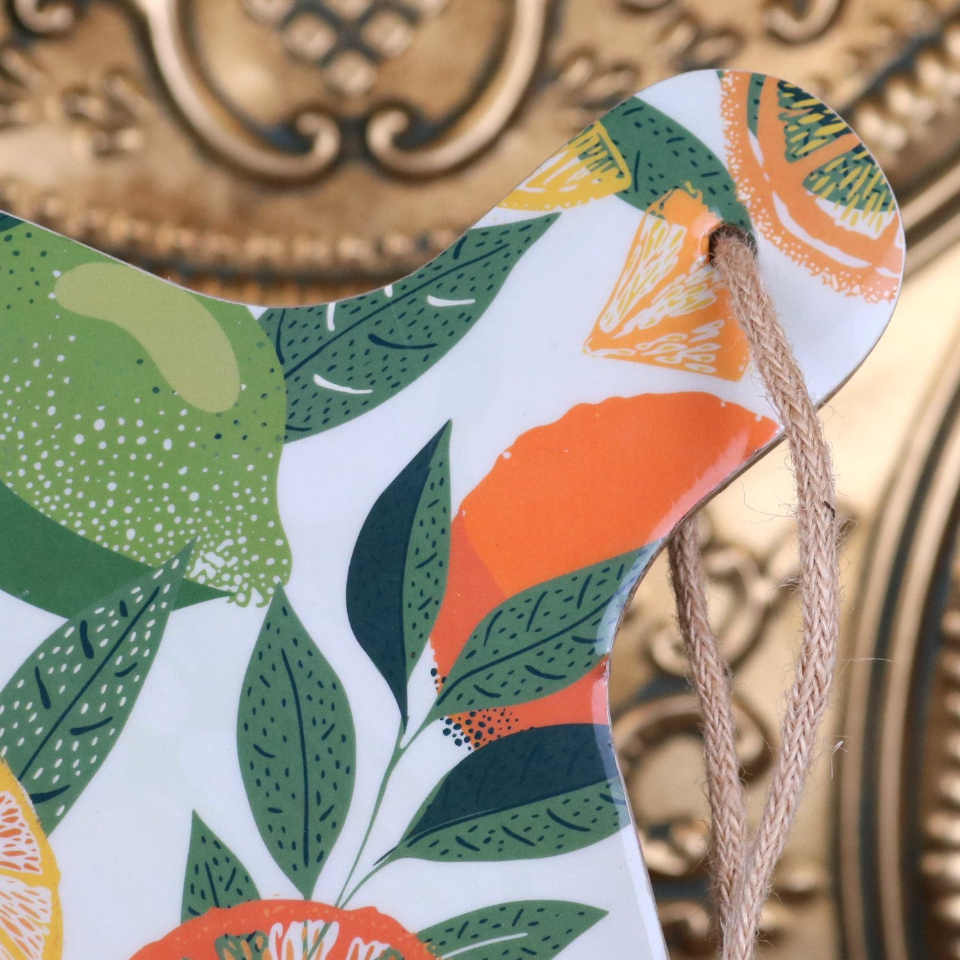 Saitras Round Chopping Board 48cm Enamel Citrus Design - Closeup of Handle