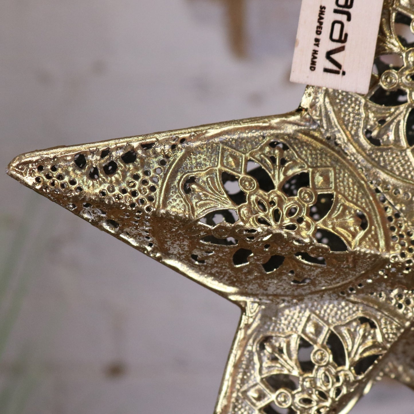 Varnika Metal Hanging Star Decoration Gold - Closeup of Cutout Design
