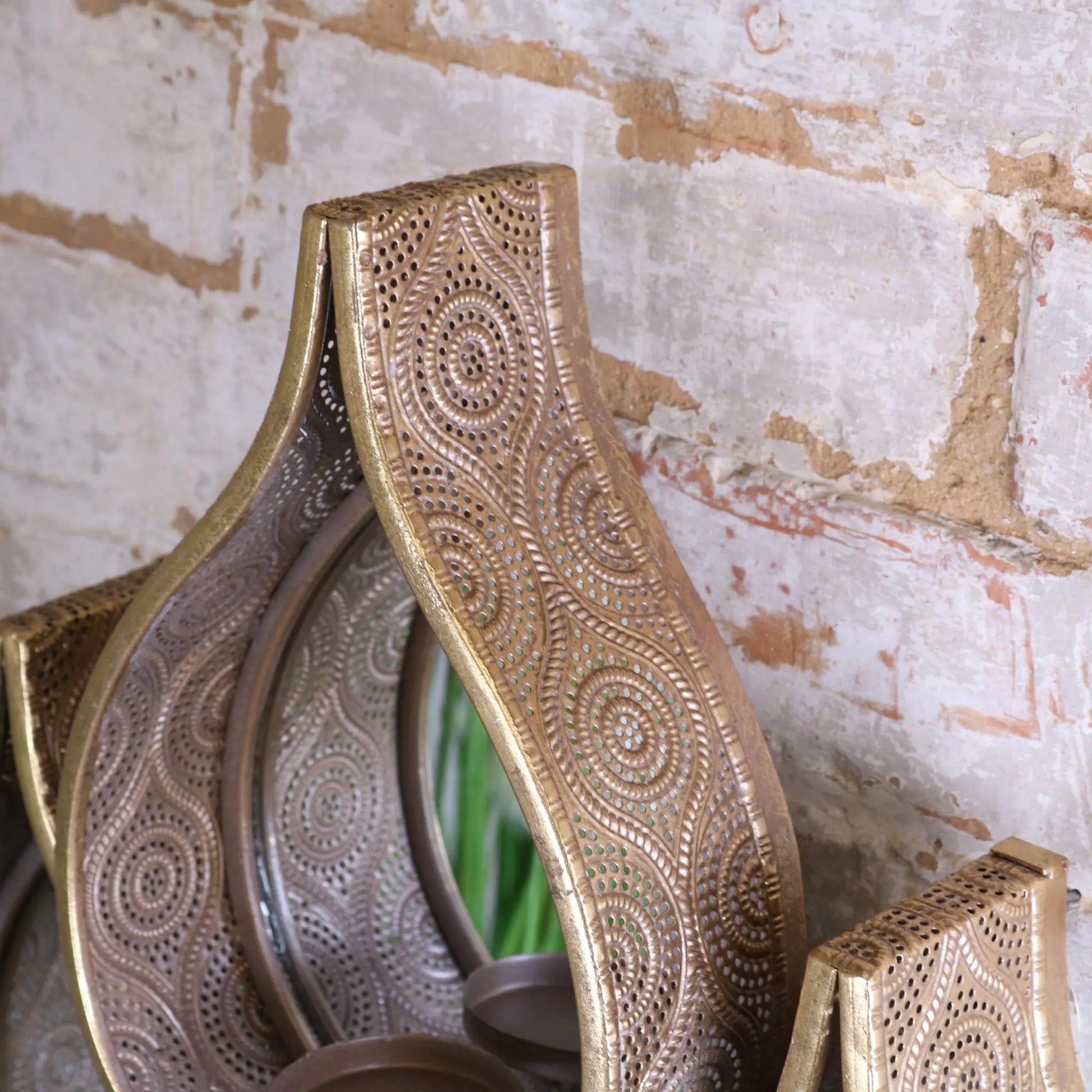 Belluri Raindrop Mirror with Candle Holders Closeup of Punched out Design