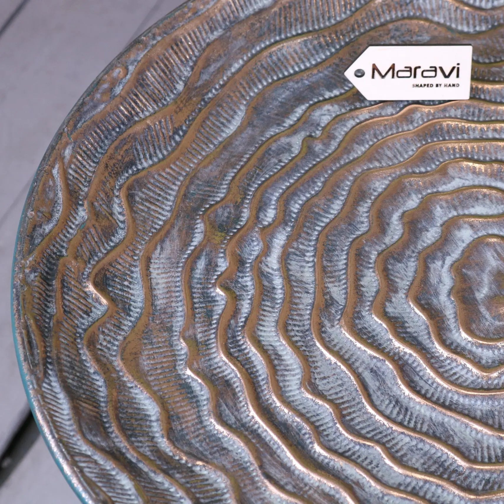 Ruwa Lightweight Antiqued Gold Tripod Side Table - Closeup of Table Top