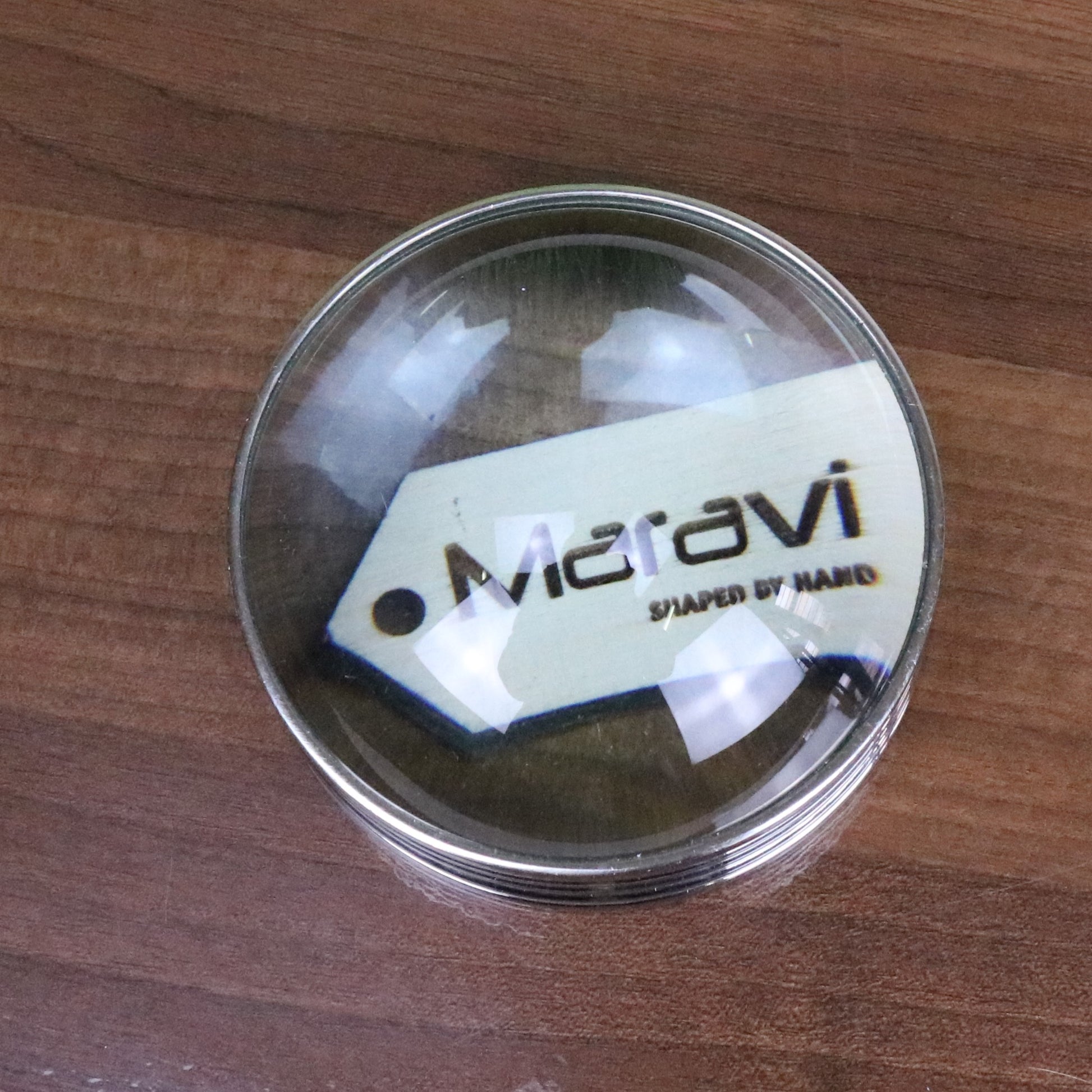Chavira Domed Magnifying Glass Paperweight - Showing Magnification