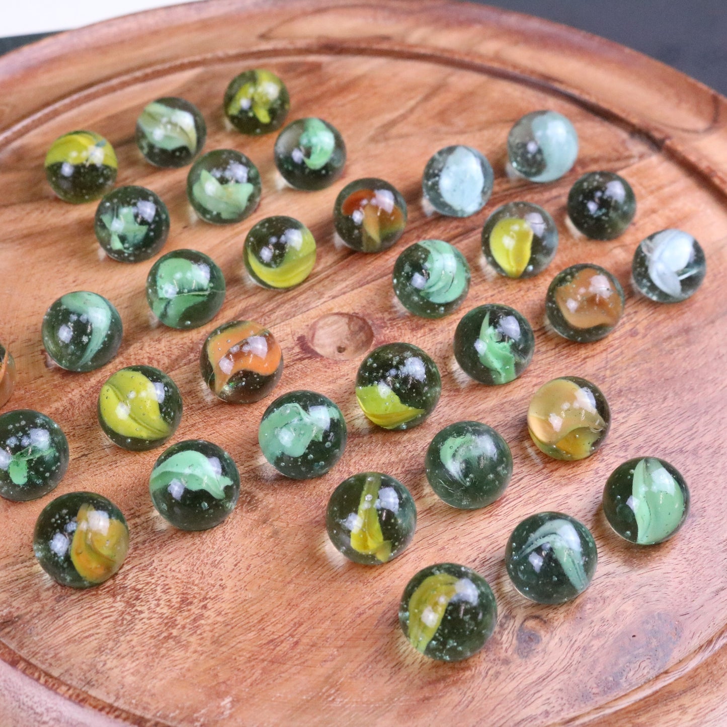 Dinod Large Wooden Solitaire Board Game Set Teak Colour - Top View Zoomed in to Marbles