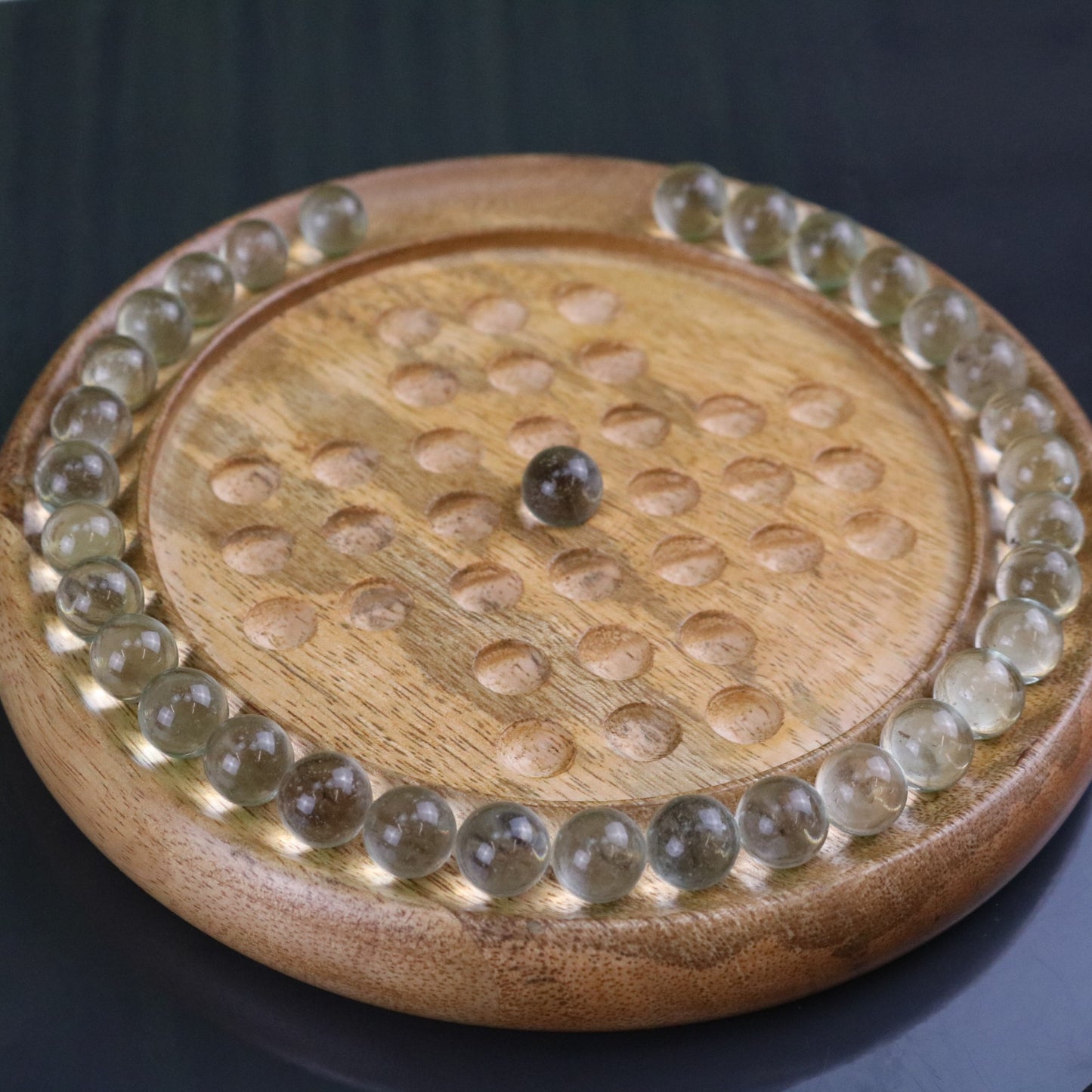 Dinod Small Wooden Solitaire Board Game Set - Zoomed In with Marbles Removed