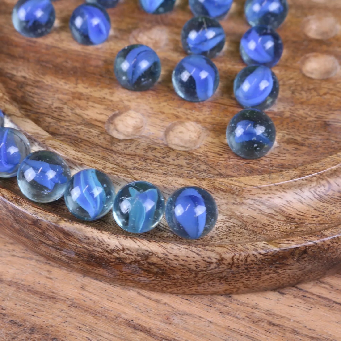 Moksha Deluxe Wooden Solitaire Set - Closeup of Marbles