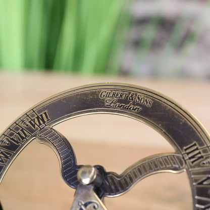 Gilbert and Sons Antique Brass Sundial Compass - Closeup of Logo