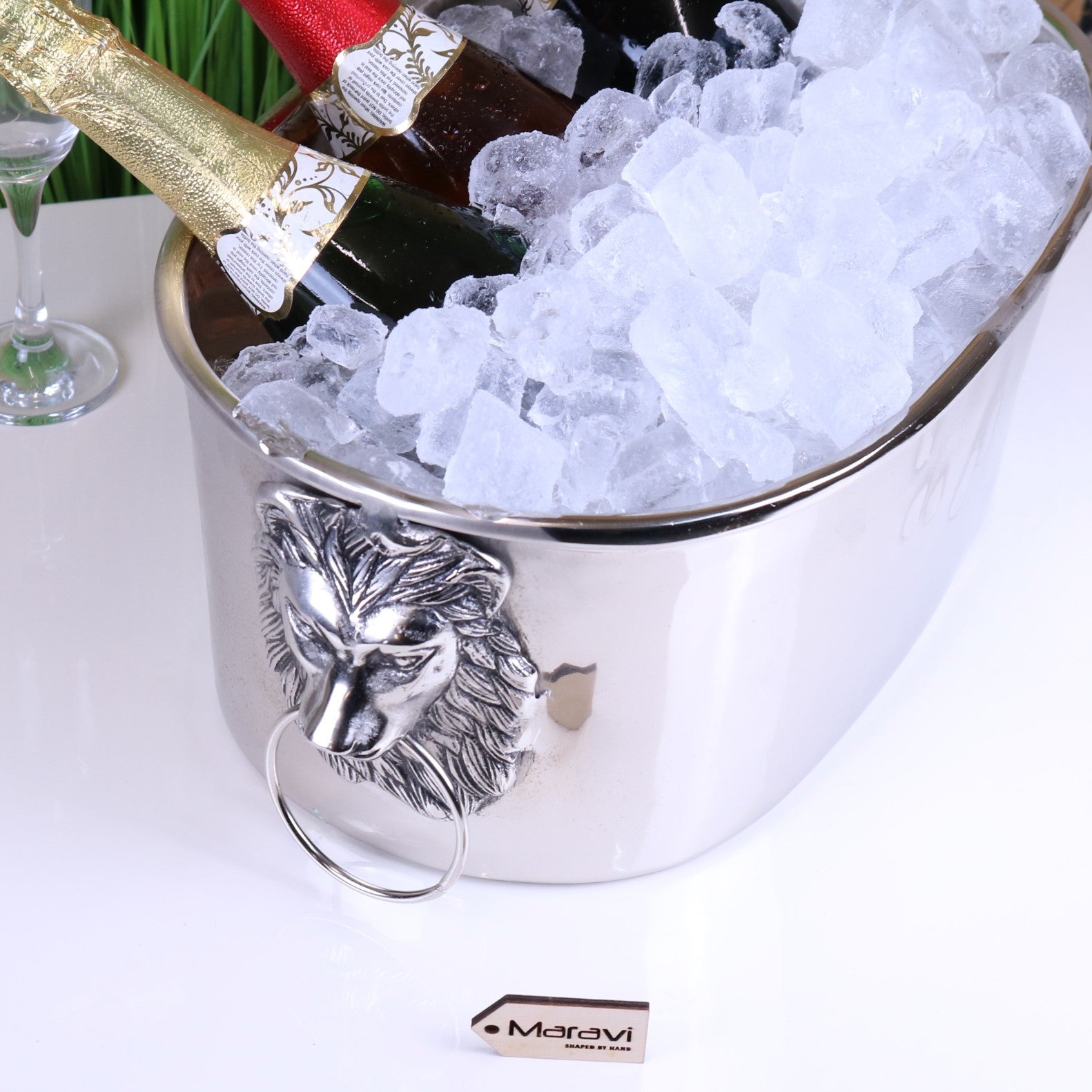 Shah Lion Handle Luxury Ice Bucket - Closeup of Lion Handle with Ice