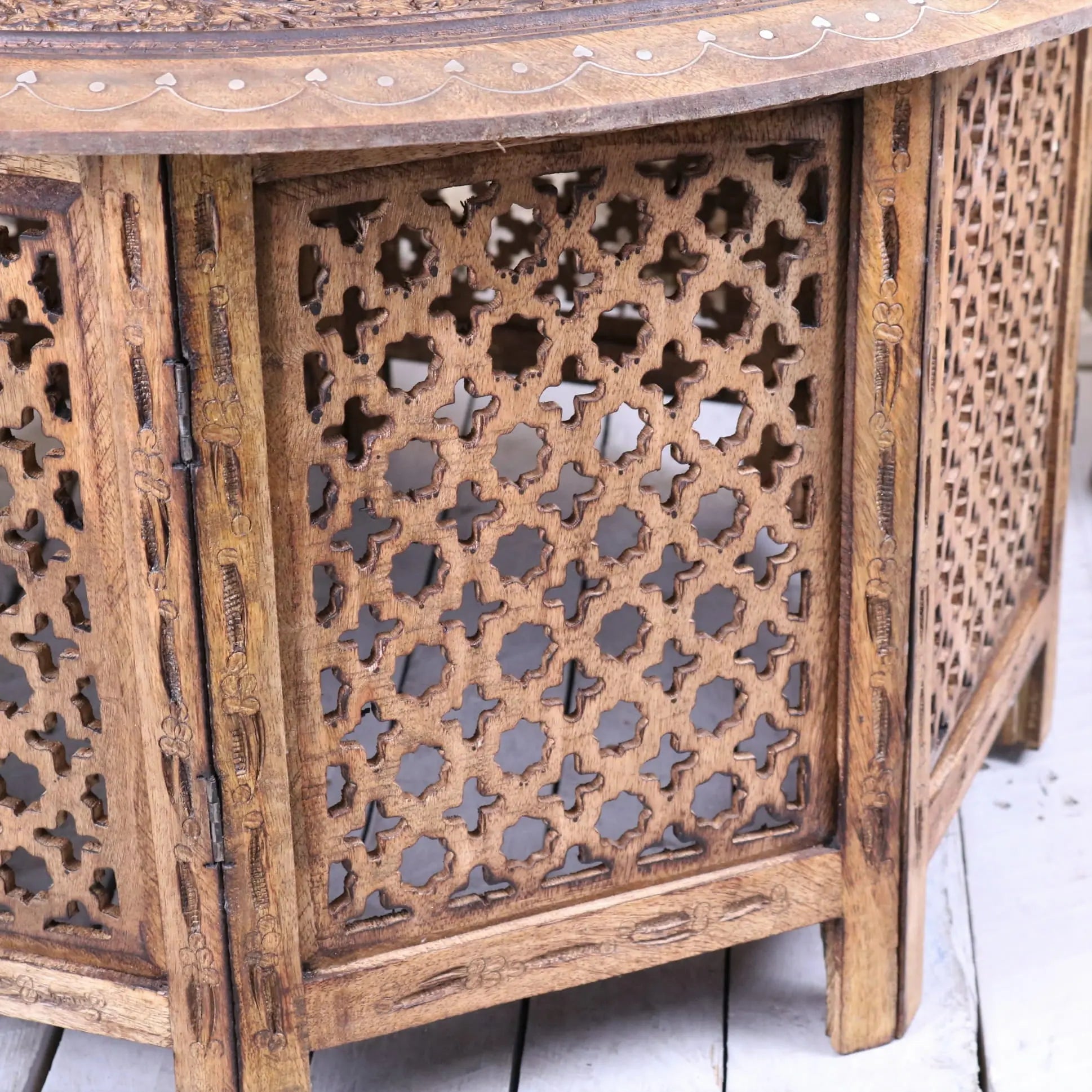 Matanga Round Wooden Coffee Table - Closeup of Base Carving Moroccan Pattern