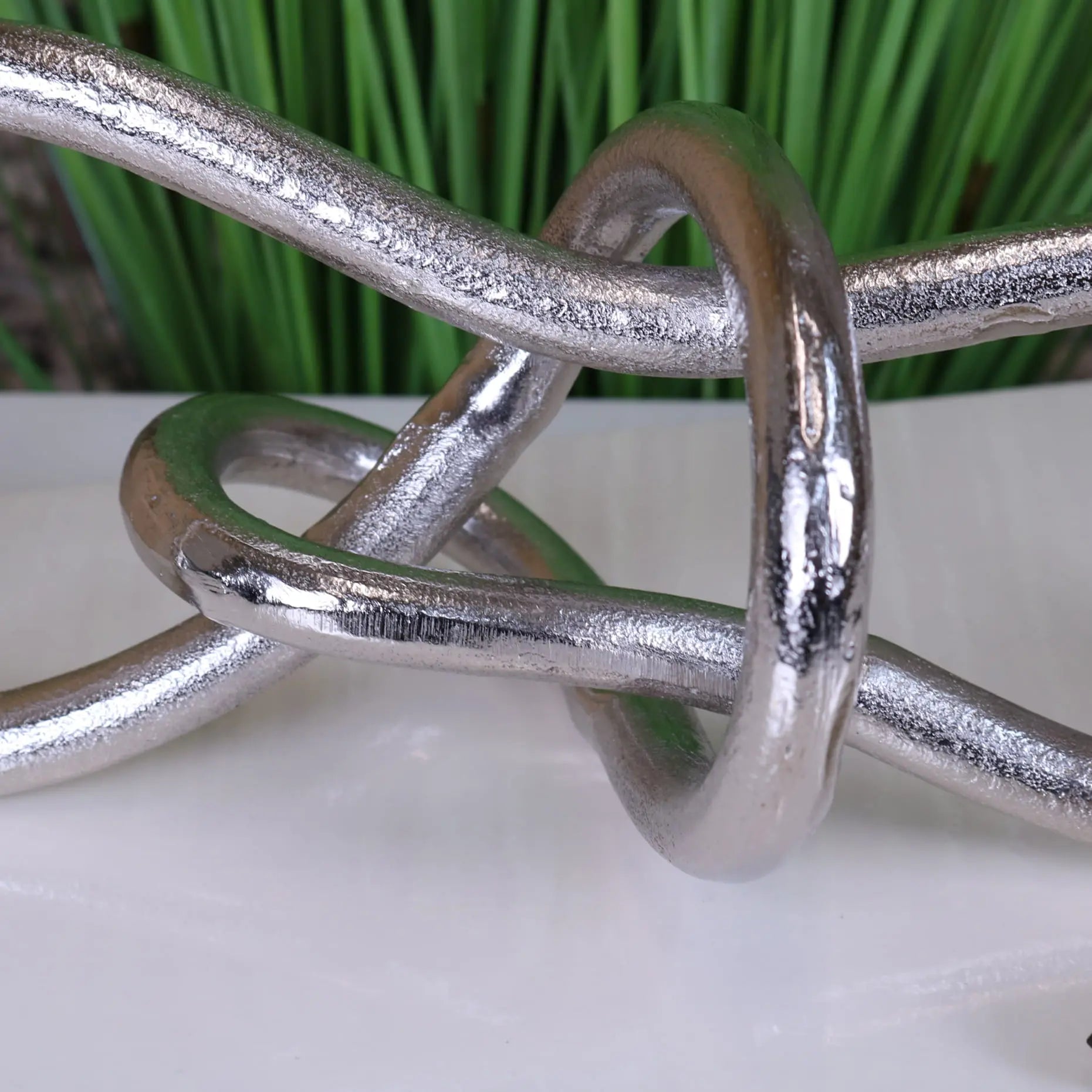 Armo Metal Knot Luxury Ornament - Closeup Mid-Section