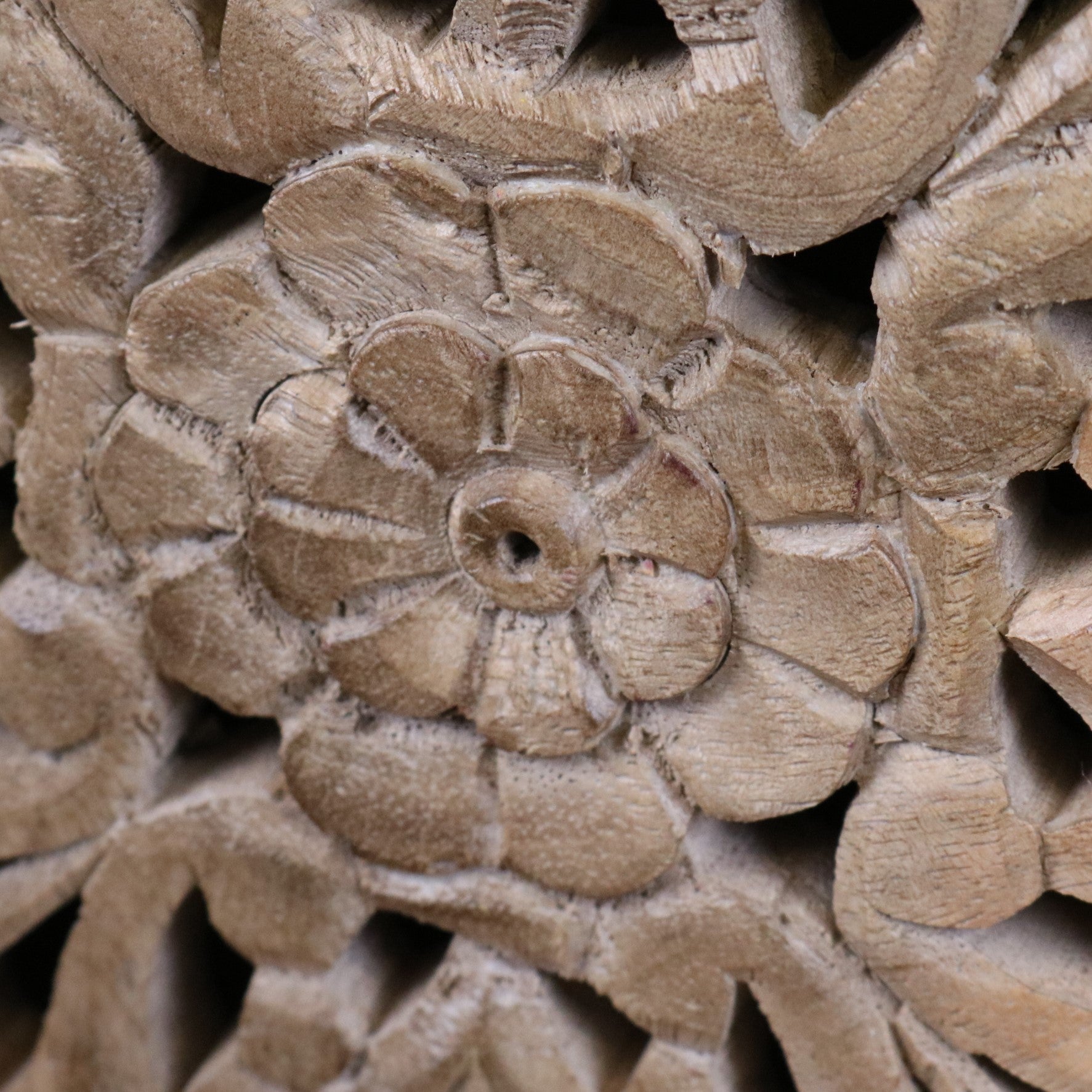 Mehira Mango Wood Bedside Cabinet - Closeup of Flower Carving