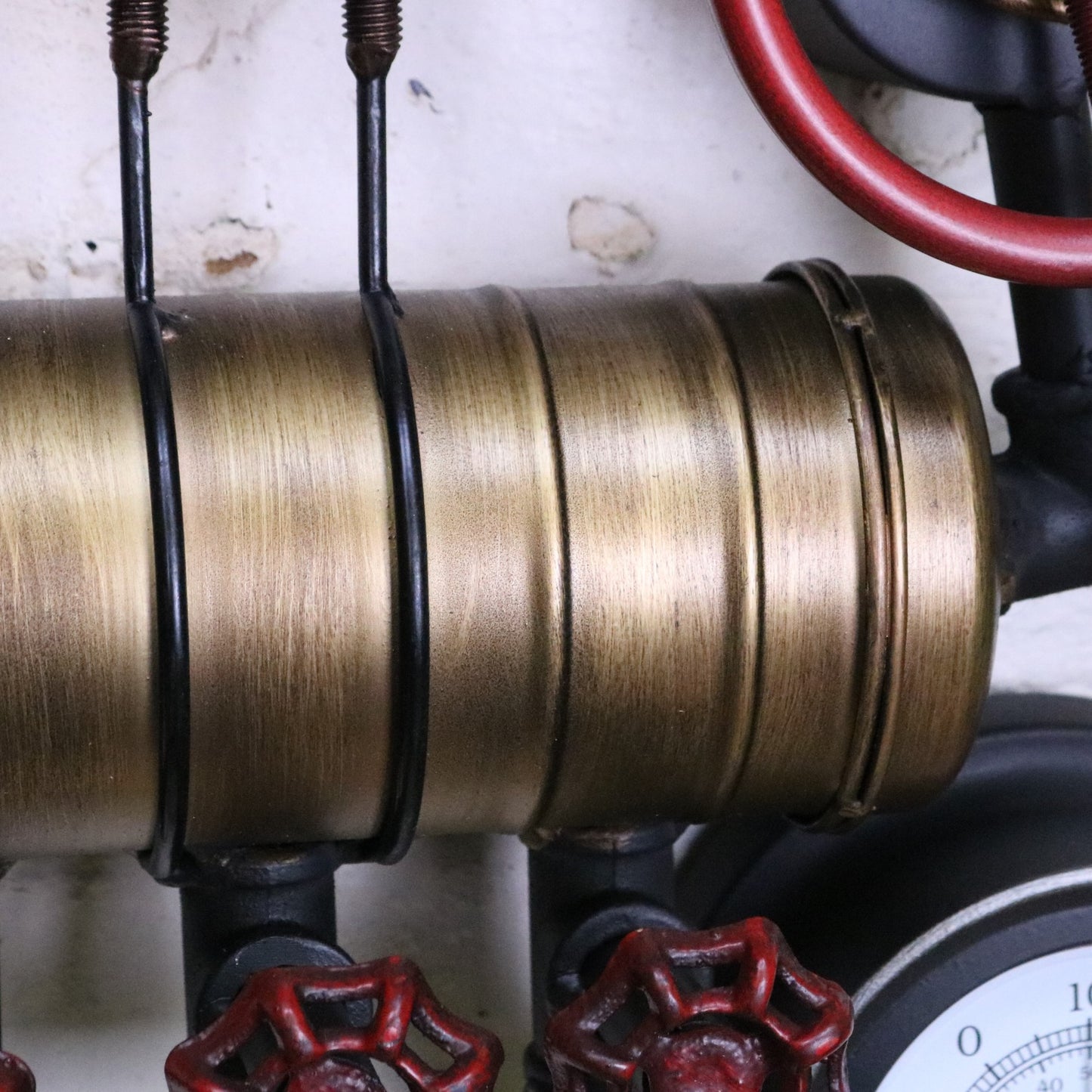 Mevara Pipe Industrial Wall Clock and Thermometer - Closeup of Gold Paint