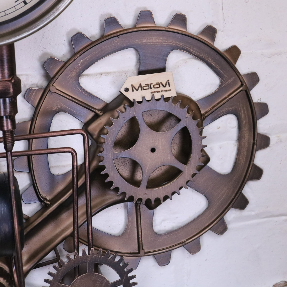 Navika Pipe Industrial Wall Clock - Closeup of Large Cog