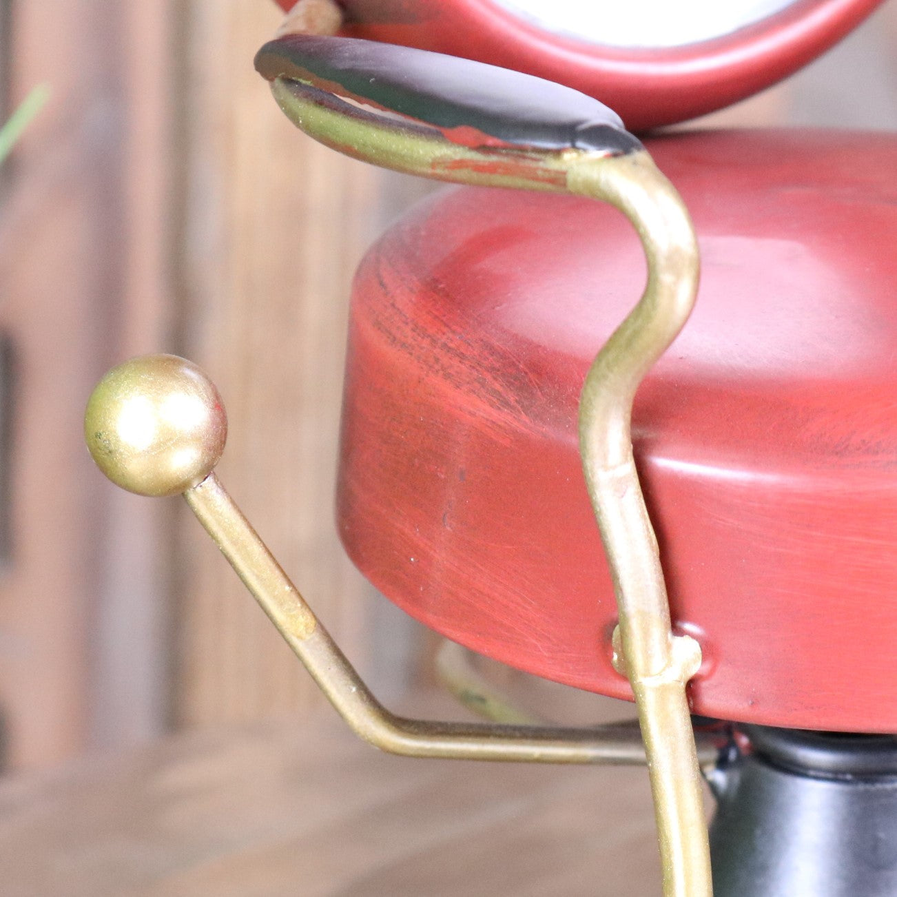 Retro Barber Clock Red Hairdressing Chair - Closeup of Gold Detailing