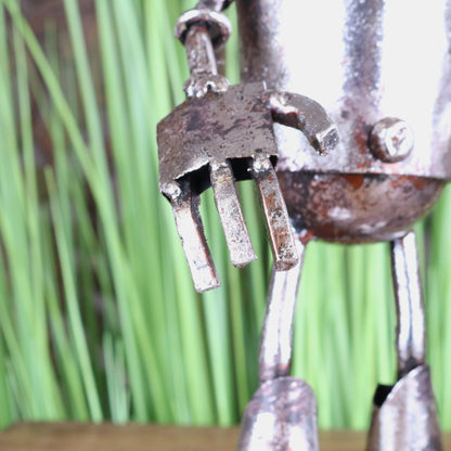 Silver Robot Ornament Springy Bobble Head - Closeup of Hand