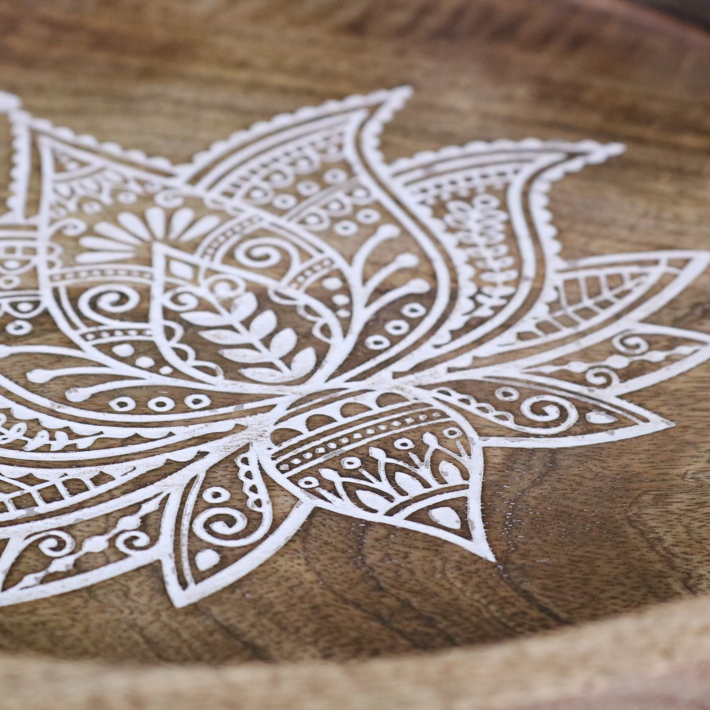 Thamara Round Mango Wood Tray - Closeup of Carved Design