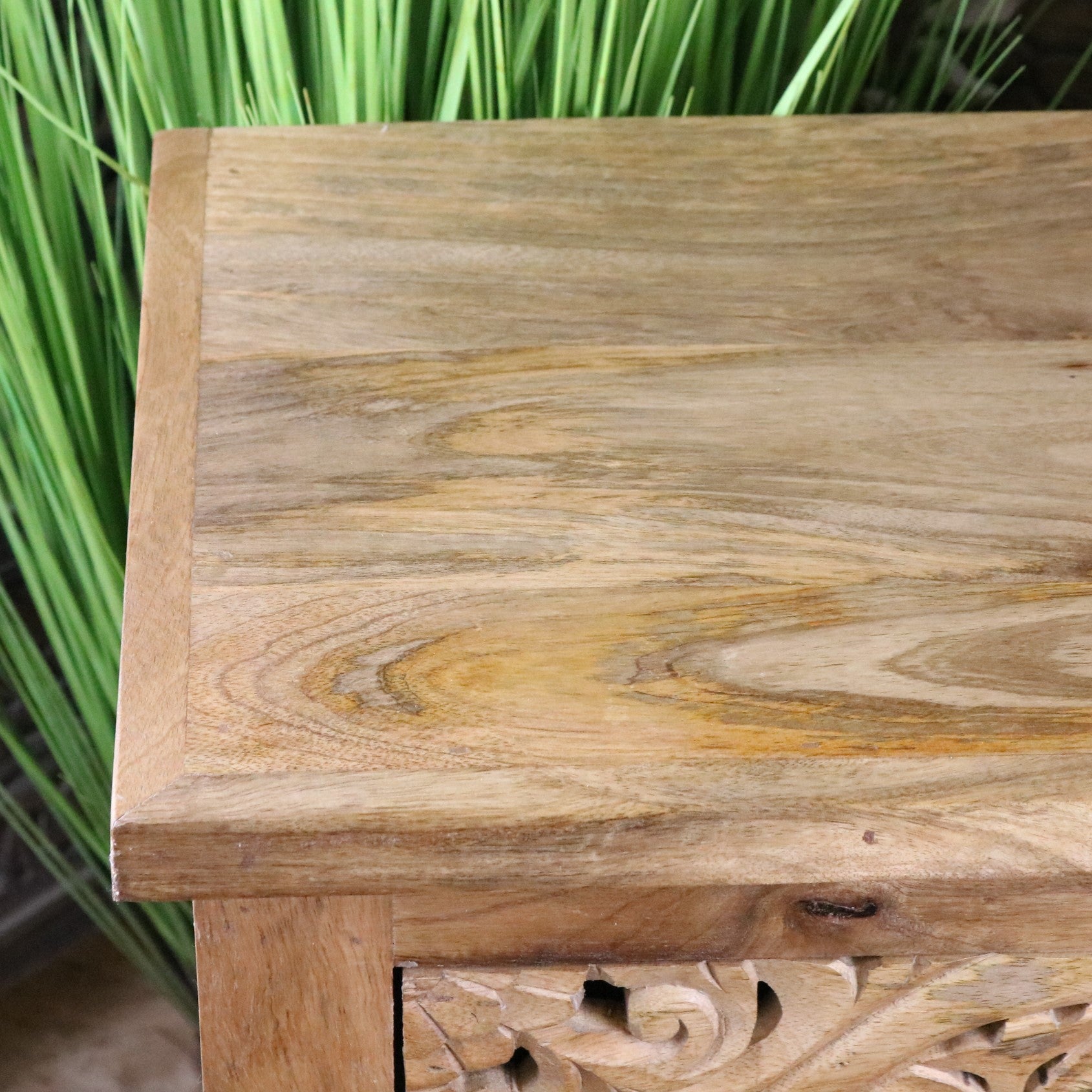 Vansura Carved Bedside Table 2 Drawer Closeup of Woodgrain on Table top 