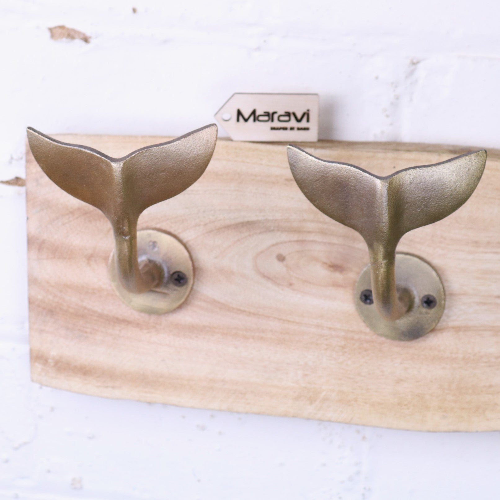 Whale Tail Hooks on Natural Wood Plank Gold - Closeup of Tails
