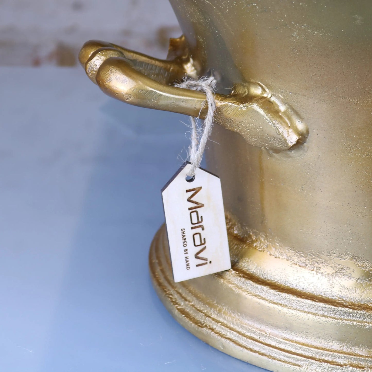 Moyar Champagne Ice Bath Cast Distressed Gold Handle Closeup