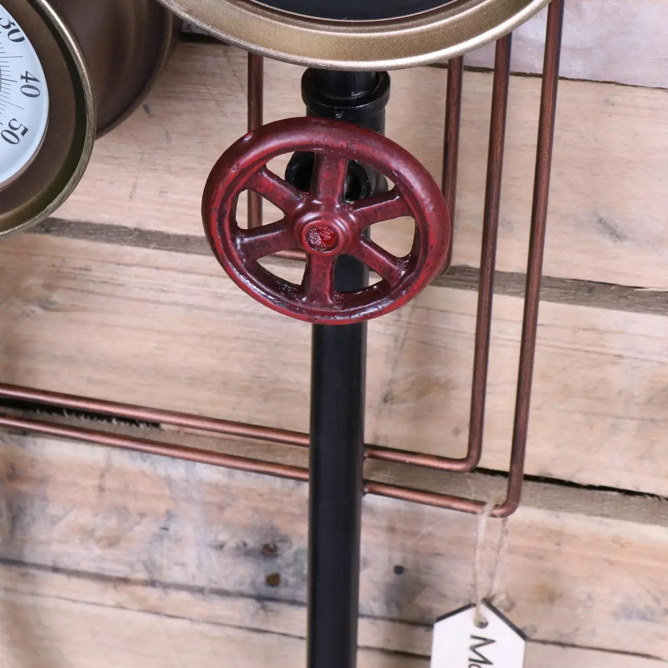 Baded Industrial Wall Pipe Clock and Thermometer - Closeup of Large Tap
